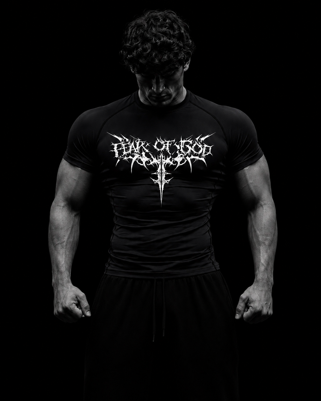 T-shirt de compression homme Fear Of God, coloris noir, porte a l entrainement en maille seconde peau.